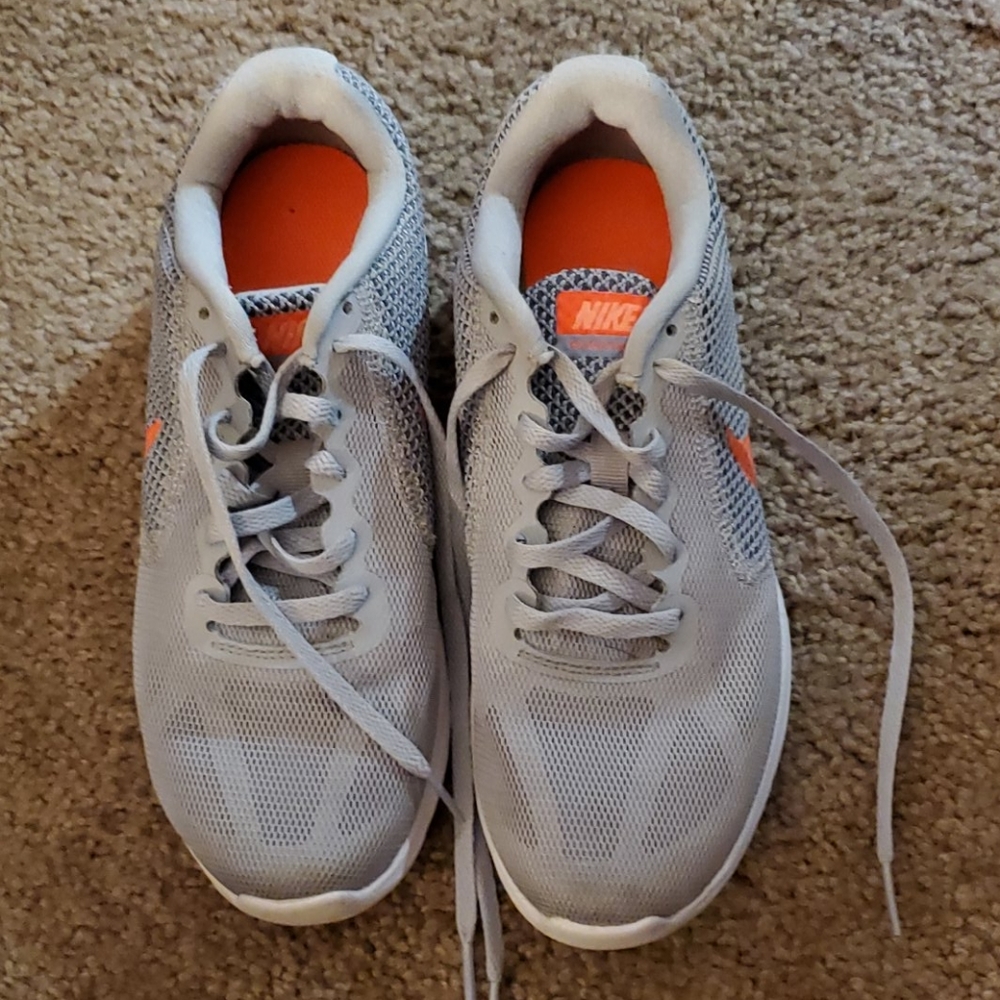 Nike brand gray and pink mesh gym shoes